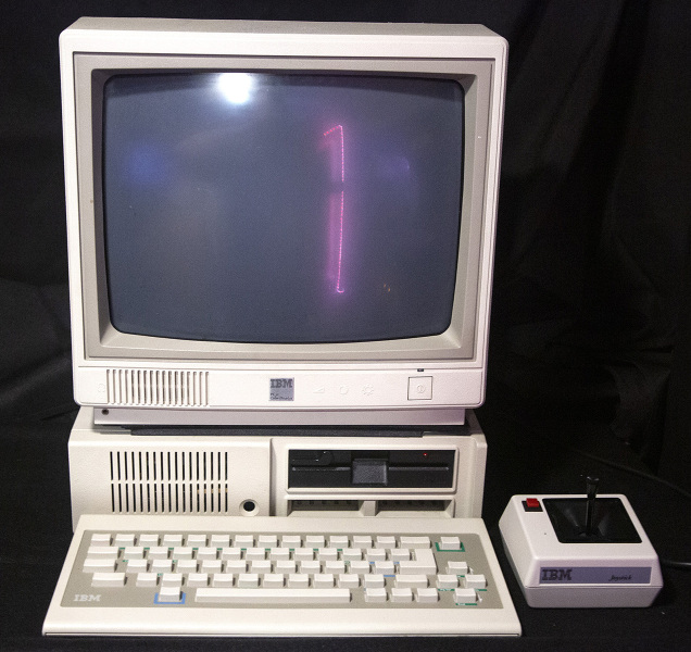 IBM PCjr with chiclet keyboard, monitor, and joystick
