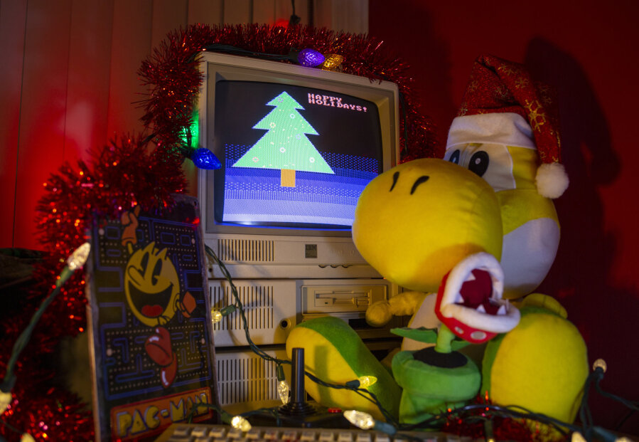 Photo of IBM PCjr, Yoshi, Piranha Plant, Pac-Man, and Christmas decorations.